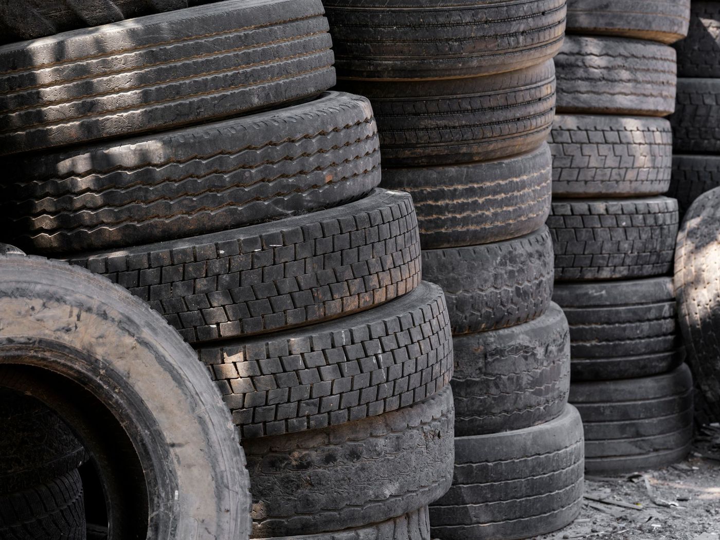 Stacks of used tyres waiting for recycling